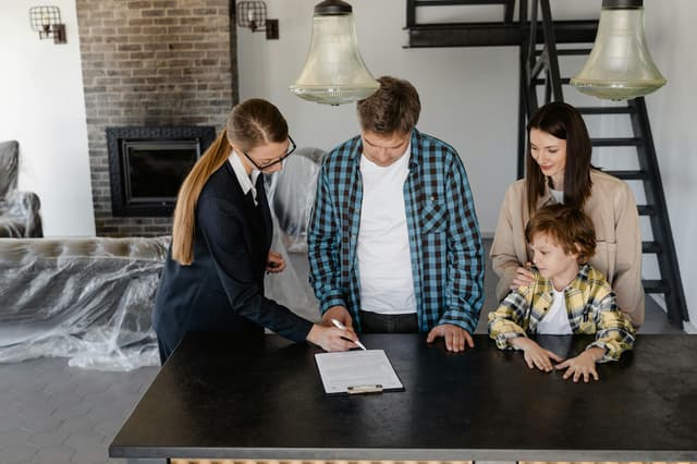 Family signing contract