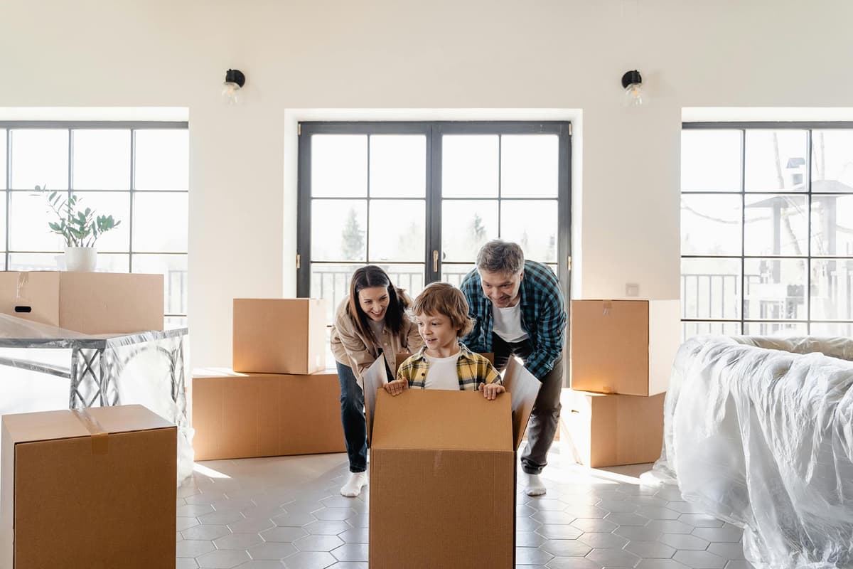 Happy family in their new home